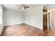 Spacious bedroom featuring hardwood floors and a ceiling fan at 2270 Old Concord Se Dr, Covington, GA 30016