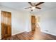 Bedroom featuring hardwood floors and a hallway with wooden door frames at 2270 Old Concord Se Dr, Covington, GA 30016