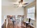 Cozy breakfast nook with a glass table and views of the fireplace/living room offering a relaxing place to dine at 2270 Old Concord Se Dr, Covington, GA 30016
