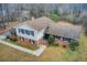 Aerial view of the brick home showing the classic design and well maintained landscaping on an ample lot at 2270 Old Concord Se Dr, Covington, GA 30016