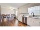 Bright kitchen features a window above the sink and an open layout, perfect for cooking and entertaining at 2270 Old Concord Se Dr, Covington, GA 30016