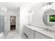 Elegant bathroom with double vanity, shiplap wall, marble floors, and a walk-in shower at 281 Green Hill Rd, Atlanta, GA 30342