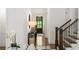 Hallway with staircase and view of the front door at 281 Green Hill Rd, Atlanta, GA 30342