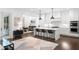 Modern kitchen with a large island, stainless steel appliances, and ample counter space at 281 Green Hill Rd, Atlanta, GA 30342