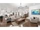 Open-concept living area with hardwood floors, neutral decor, and seamless connection to the kitchen at 281 Green Hill Rd, Atlanta, GA 30342