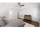 Bright main bedroom featuring hardwood floors, neutral tones, and access to the ensuite bathroom at 281 Green Hill Rd, Atlanta, GA 30342