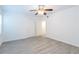 Spacious bedroom with gray wood-look flooring and ceiling fan at 1201 Old Hammond, Atlanta, GA 30350