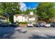 Apartment complex with ample parking and mature trees at 1201 Old Hammond, Atlanta, GA 30350