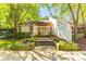 Inviting building exterior with a landscaped entrance and walkway at 1201 Old Hammond, Atlanta, GA 30350