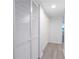 Hallway featuring multiple closet doors for optimal storage space at 1201 Old Hammond, Atlanta, GA 30350