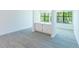 Living space with built-in cabinets and plenty of natural light at 1201 Old Hammond, Atlanta, GA 30350