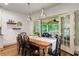 Cozy dining room features french doors that open onto a covered patio at 2314 Tall Timbers Ln, Marietta, GA 30066