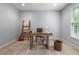 Bright home office featuring neutral walls, a wooden desk, natural light, and carpeted floors at 2314 Tall Timbers Ln, Marietta, GA 30066