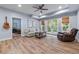 Cozy living room with hardwood floors, fireplace, and natural light at 2314 Tall Timbers Ln, Marietta, GA 30066