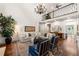 Bright and open living room with hardwood floors and a grand chandelier at 2314 Tall Timbers Ln, Marietta, GA 30066
