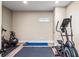 Home workout area with gym equipment and rubber flooring at 2314 Tall Timbers Ln, Marietta, GA 30066