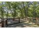Backyard deck overlooks green space at 2371 Leguin Mill Rd, Locust Grove, GA 30248