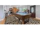 Entertaining game room featuring a pool table and fun decor at 2371 Leguin Mill Rd, Locust Grove, GA 30248