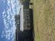Exterior view of greenhouse against a slightly cloudy sky at 2371 Leguin Mill Rd, Locust Grove, GA 30248