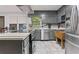 Updated kitchen with stainless steel appliances, and plenty of counter space and storage at 2371 Leguin Mill Rd, Locust Grove, GA 30248