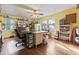 Spacious office or craft room with lots of natural light and hardwood floors at 2371 Leguin Mill Rd, Locust Grove, GA 30248