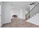 Spacious entryway that leads to the dining room and staircase to the upper level at 4865 Chesterfield Ct, Suwanee, GA 30024