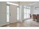 Bright foyer with beautiful floors and natural light streaming through the windows at 4865 Chesterfield Ct, Suwanee, GA 30024