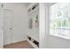 Mud room with built-in storage and natural light at 4865 Chesterfield Ct, Suwanee, GA 30024