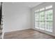 Bright and airy room boasts plenty of natural light from surrounding windows at 4865 Chesterfield Ct, Suwanee, GA 30024