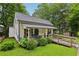 Charming cottage-style home with a welcoming front porch and a convenient handicap ramp at 2860 Jefferson St, Austell, GA 30106