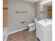 Bathroom featuring vanity with sink, toilet, and bronze fixtures at 4810 Habersham Se Way, Conyers, GA 30094