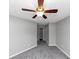 Bedroom featuring neutral walls, plush carpeting, ceiling fan and natural light. Ready for your personal touches! at 4810 Habersham Se Way, Conyers, GA 30094