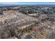 An aerial view showcases the property's location in a neighborhood with nearby buildings at 5774 Forest Dr, Acworth, GA 30102