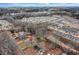 An aerial perspective shows the property's location within a residential area with many nearby houses at 5774 Forest Dr, Acworth, GA 30102