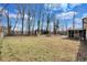 Expansive backyard with a screened patio, perfect for outdoor entertaining and relaxation at 5774 Forest Dr, Acworth, GA 30102