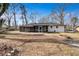 Generous backyard with a quaint patio area, ideal for enjoying the outdoors at 5774 Forest Dr, Acworth, GA 30102