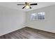 Bedroom with hardwood floors, a ceiling fan and natural light from the windows at 5774 Forest Dr, Acworth, GA 30102