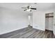 Bedroom featuring hardwood floors, a ceiling fan and a closet at 5774 Forest Dr, Acworth, GA 30102