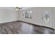 Inviting living room features large windows and modern gray flooring at 5774 Forest Dr, Acworth, GA 30102