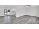 Bright living room with hardwood floors, ceiling fan and a view to the kitchen at 5774 Forest Dr, Acworth, GA 30102