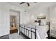 Inviting bedroom with a cozy bed, en-suite bathroom access, and minimalist decor at 1101 Juniper Ne St # 1012, Atlanta, GA 30309