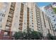 A multi-story condo building featuring multiple balconies and a red brick facade on the lower level at 1101 Juniper Ne St # 1012, Atlanta, GA 30309