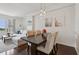 A view of the dining and living areas featuring a comfortable couch and a view from the window at 1101 Juniper Ne St # 1012, Atlanta, GA 30309