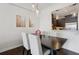 Bright dining room featuring lots of light, modern decorations, and dark wood floors at 1101 Juniper Ne St # 1012, Atlanta, GA 30309