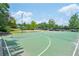 Well-maintained community basketball court perfect for games, practice, and staying active outdoors at 153 Towey Trl, Woodstock, GA 30188