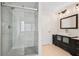 Bathroom with an oversized glass shower, modern vanity, and stylish fixtures at 153 Towey Trl, Woodstock, GA 30188