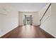 Inviting living area with hardwood floors and large bay window at 153 Towey Trl, Woodstock, GA 30188