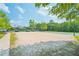 Sandy community volleyball court and multi-use area for a variety of outdoor activities at 153 Towey Trl, Woodstock, GA 30188
