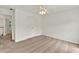 Bright bedroom features neutral carpet, ceiling fan, and closet with double doors at 240 Flowers Cove Ln, Lilburn, GA 30047