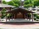 Charming outdoor stage in a community gathering space, perfect for events and performances at 240 Flowers Cove Ln, Lilburn, GA 30047